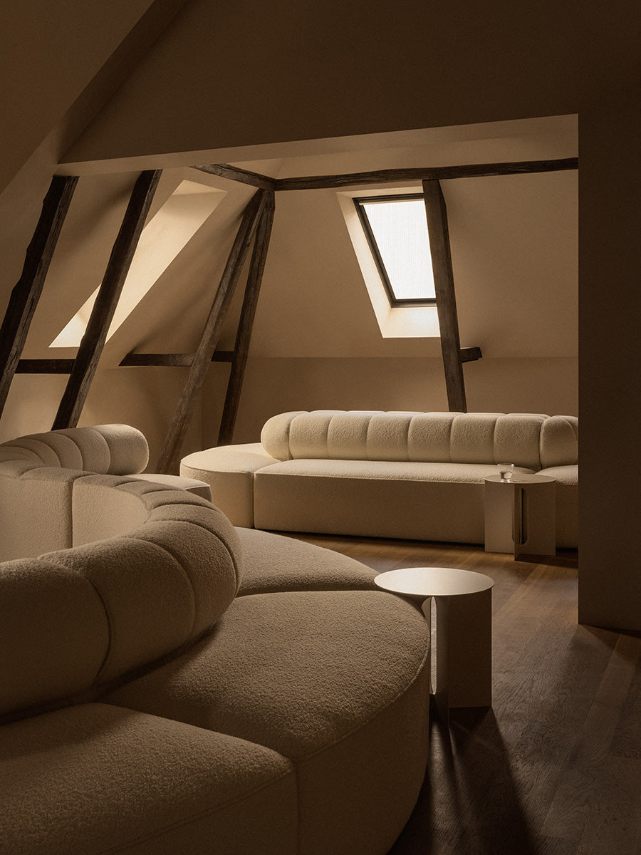 White couch in dimly lit room