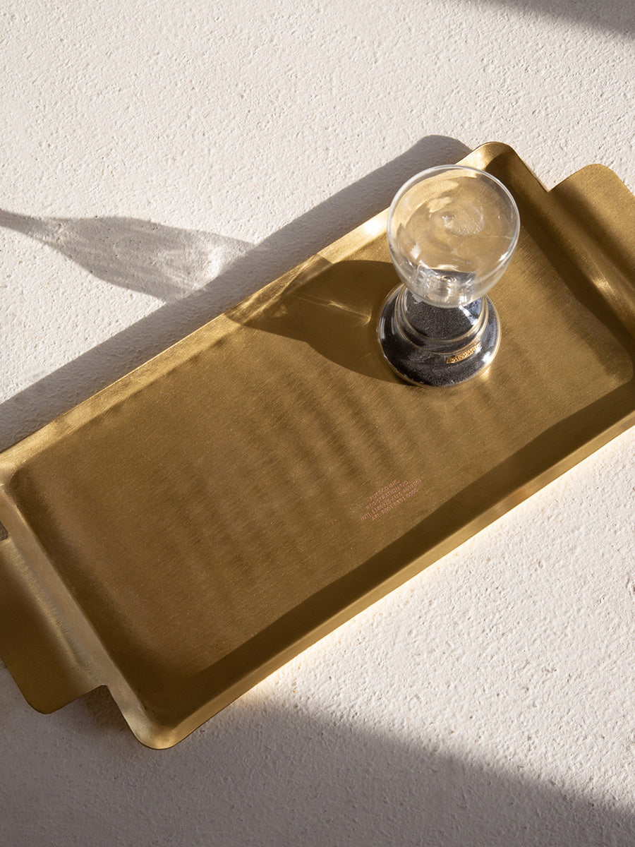 glass on brass tray