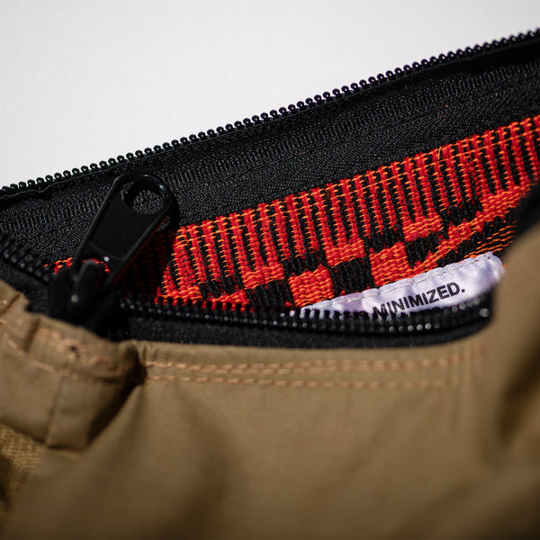 Rubberized Hood Fabric x Jacquard Pouch
