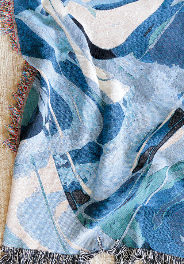 Depths Woven Throw Blankets