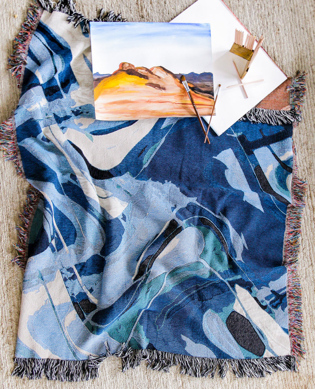 Depths Woven Throw Blankets