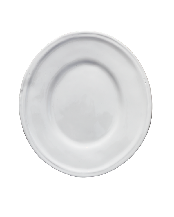 White ceramic plate on a white background