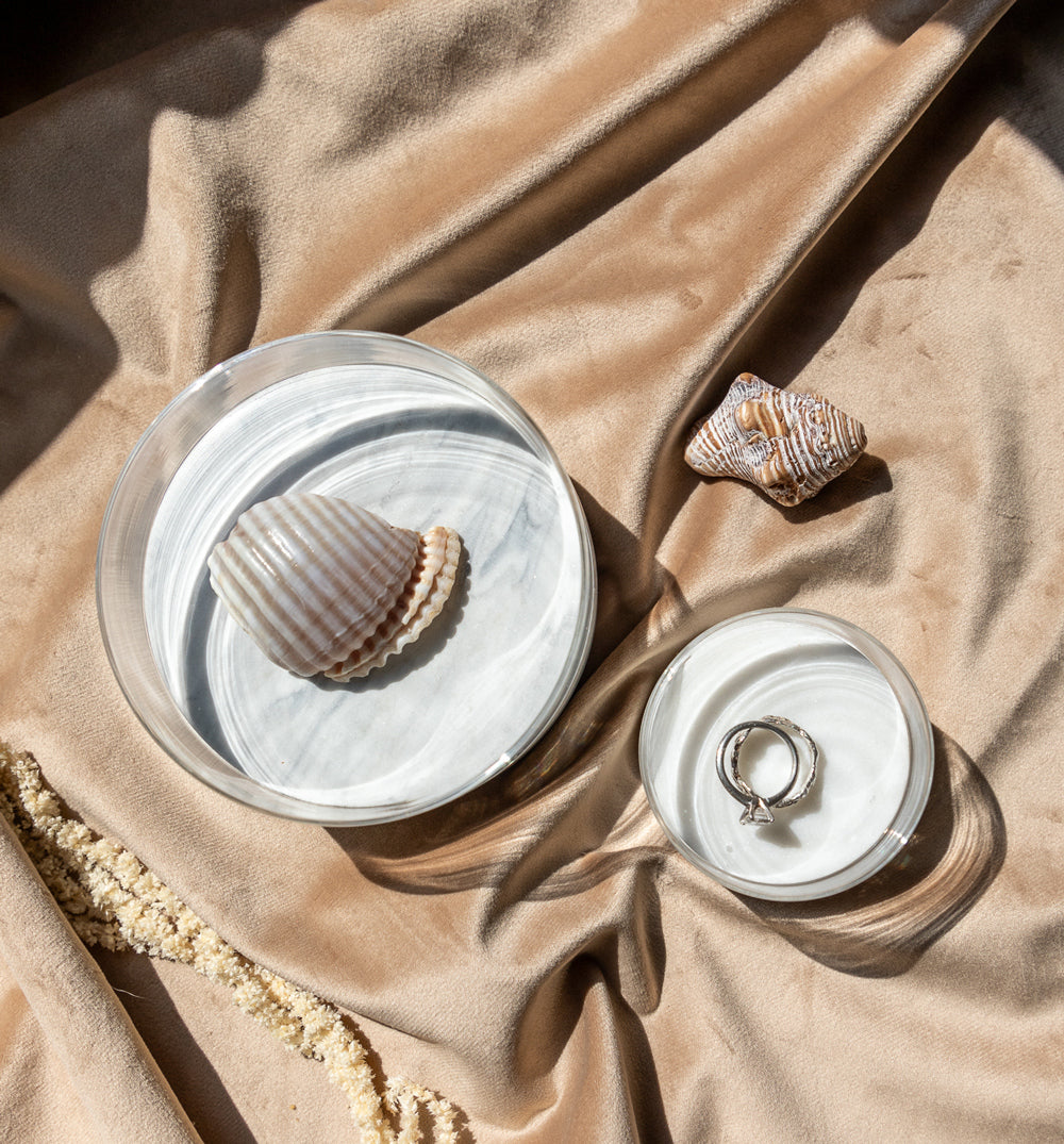 Shells in glass containers